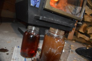 Lye water mixture in jars after being separated from the ash
